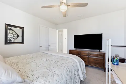 Bedroom with a double door closet