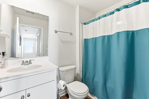 Upstairs hall bath with a tub and shower combo
